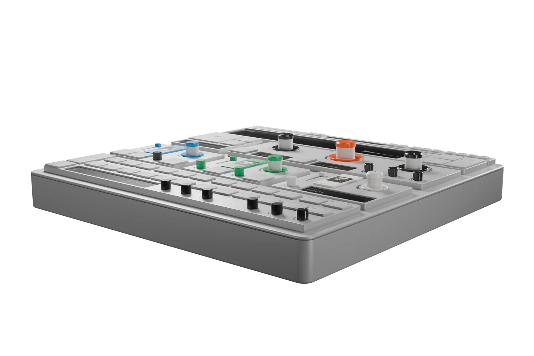 Reverse King 3 from the front right, just above the desk: its thick rounded chassis and stepped plates, with the orange, green, blue and white knob caps standing up along the face