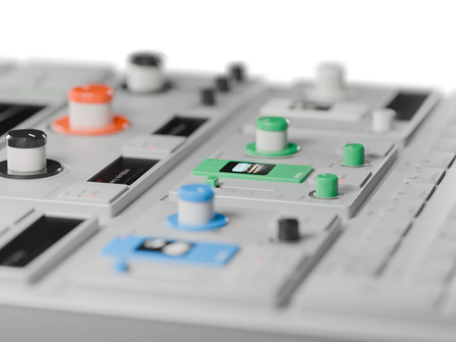 A low, raking view along the engine row from the left: the green delay key with its tape-echo picture in focus, the blue buffer key and knob in front and the white reverb group out of focus
