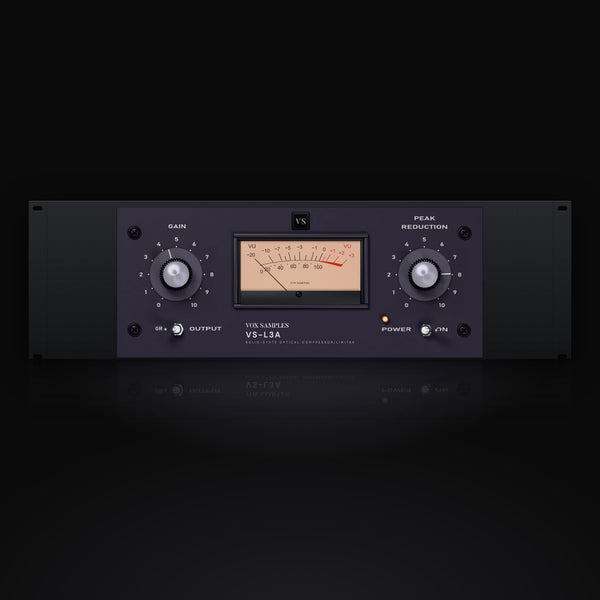 VS-L3A by Vox Samples, the solid-state optical compressor plugin, pictured as its front panel: a dark violet-grey rack unit with a peach VU meter, the GAIN and PEAK REDUCTION knobs scaled 0 to 10, the GR and OUTPUT meter switch and the POWER switch with its lamp.