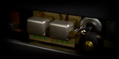 LoFi Pro 2, MAGNETIC: close on a tape head block, its tape guides and a roller