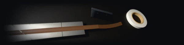 Pitch Suite Pro, GRANULAR: a tape splicing block, a strip of cut tape and a roll of splicing tape