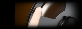 Reverse King 3, FLANGER: a fingertip pressing the rim of a turning tape reel