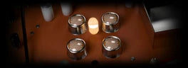 Reverse King 3, VIBRATO: the inside of a vibe unit, a lamp and photocells on its circuit board